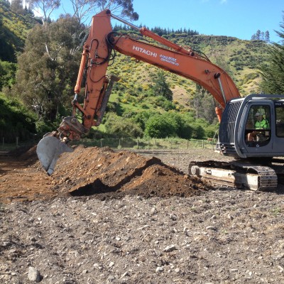 20 Tonne digger digging out the arena in preparation for screening